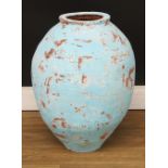 A Turkish painted terracotta olive pot, 57cm high