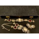 A silver filigree necklace and bracelet suite, set with cameo; a filigree butterfly brooch (3)