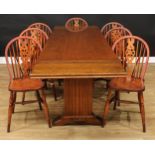 An Art Deco inspired oak dining table, rectangular top with two additional leaves, 76cm high, 185.