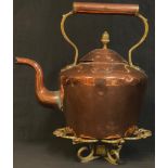 A Victorian copper kettle, hinged cover, acorn knop finial; a pierced brass trivet (2)