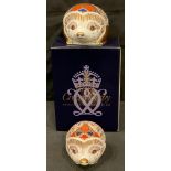 A pair of Royal Crown Derby paperweights, Hawthorn and Bramble Hedgehog, gold stoppers, one boxed (