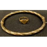 An Italian 14k gold hinged bangle, 5.6g; a 9ct gold ring, 1.11g (2)