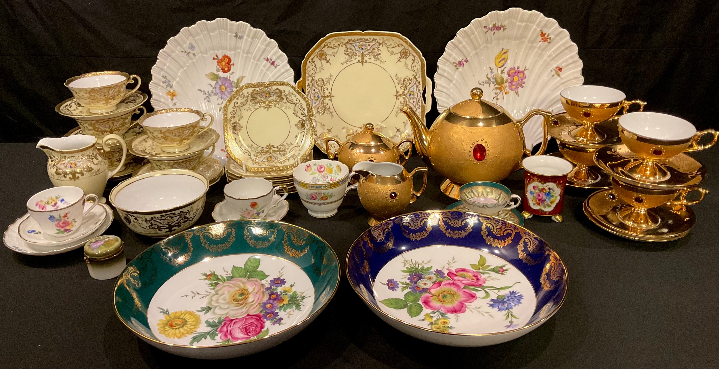 Continental Ceramics - a pair of shell shaped dishes; a Bavarian gilded and bejewelled part tea