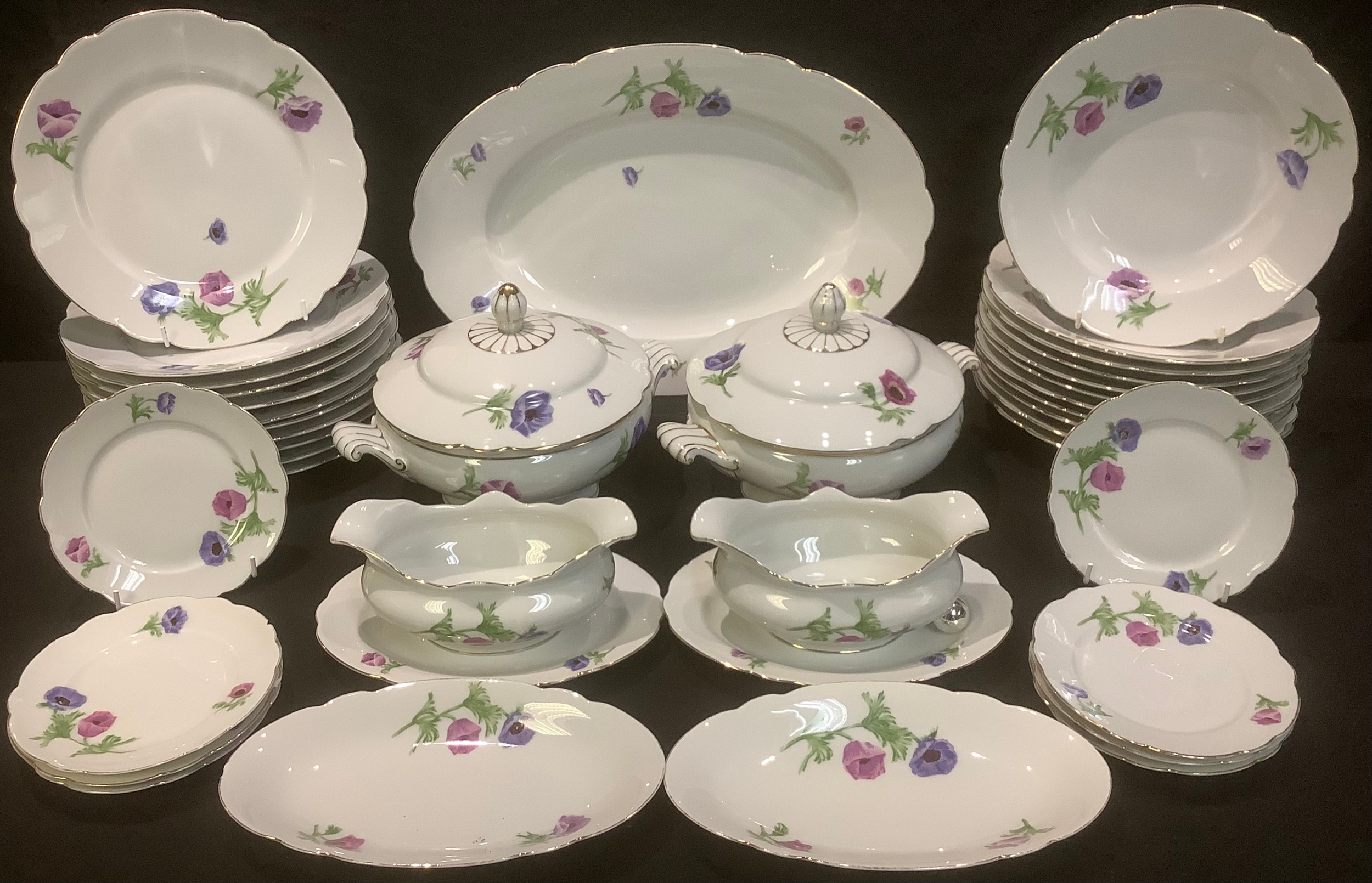 A Continental KPM Thyra pattern part dinner service comprising vegetable dishes, large serving
