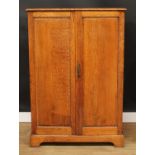 An oak hall robe, of small and neat proportions, rectangular top above a pair of raised and