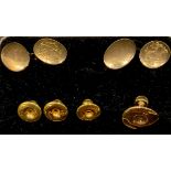 An 18ct gold suite of gentleman's cuff links and collar studs, all marked 18ct, the pair of cuff