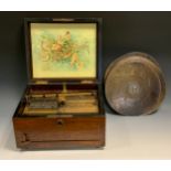 A 19th century walnut table-top symphonion, the mechanism playing 25.5cm discs, hinged top inscribed