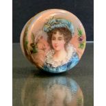 A 19th century Austrian silver and enamelled circular box and cover, the cover with beauty, the