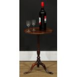 A 19th century mahogany tripod wine table, of small proportions, dished circular top, turned column,