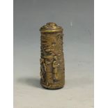 A novelty brass cylindrical vesta case, embossed with figures, 5cm long