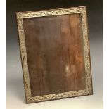 A large Continental silver and rosewood rectangular easel photograph frame, the pierced mounts