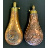 A 19th century copper shot flask, embossed with a deer stalking scene, sprung mechanism, 18.5cm