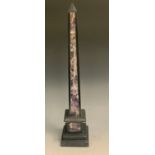 An amethyst quartz and black marble library obelisk, stepped bases, 40cm high