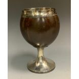 A George III silver mounted coconut cup, flared circular foot, 18.5cm high, Thomas Phipps & Edward