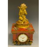 A late 19th century French 'tortoiseshell' and ormolu clock, 6cm diam white enamelled dial, with