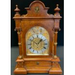 A Victorian oak bracket musical clock, 18.5cm dial with silvered chapter ring, Roman numerals, Eight