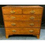 A 19th century mahogany chest, c.1820 of two short and three long drawers, bracket feet 92cm high