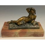 A 19th century bronze desk weight, of a lady reclining, rectangular marble base, 12cm wide