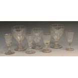 An early 19th century pedestal rummer, 12cm high, c.1810; others; Victorian wine glasses (7)