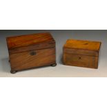A 19th century mahogany tea caddy, quite plain, the interior with two lidded compartments, bun feet,