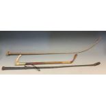 A 20th century horn hafted riding whip, 47cm long; ohers, leather plaited, 78cm long; C & J Zair