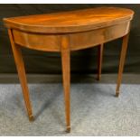 A George III mahogany D-shaped card table, tapering square legs, satinwood banding and boxwood