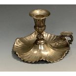 A Continental silver coloured metal chamberstick, campana sconce, fluted base, 13.5cm wide,