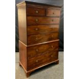 A 19th century mahogany chest on chest, moulded cornice above two short and three long drawers,