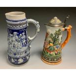 A German spreading cylindrical tavern jug, in the manner of Mettlach, in relief with revellers, in