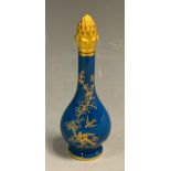 A Lynton tear-shaped scent bottle, the turquoise ground gilt in relief and tooled with a pair of