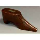 A 19th century rosewood novelty snuff box, as a shoe, c.1840 decorated with brass pinwork, sliding