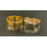 A matched Edwardian and later two section interconnecting diamond engagement and wedding ring set,
