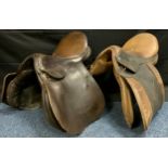 An English Albion Saddlery leather saddle, 17in; another (2)