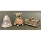 A Victorian silver bell, Sheffield 1897; a novelty teddy bear pin cushion, stamped silver; a