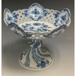 A Meissen Onion pattern pedestal dished comport, decorated in underglazed blue, with stylised