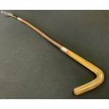 Equestrian - a silver coloured metal mounted leather riding crop, L-shaped horn handle, the ferule