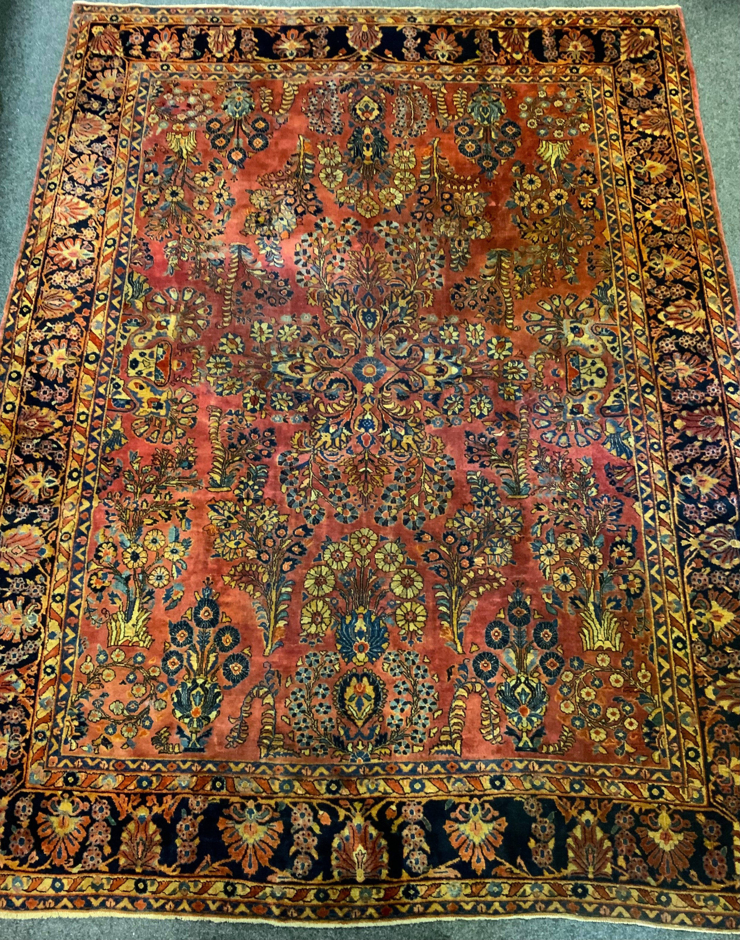 A large Persian, hand-knotted, Moharjeran rug, the central floral medallion within a field of