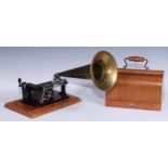 An early 20th century EWC (Germany) phonograph, the base 31.5cm wide