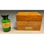 A Victorian mahogany rectangular box, with thirty apertures for pharmaceutical bottles, drawer to