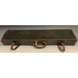 An early 20th century leather rectangular gun case, 82.5cm wide