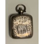 An Edwardian silver square sovereign case, engraved and chased with foliate scrolls, 3cm high,