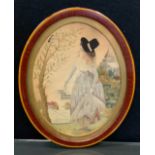 A George III oval silk, embroidered with a lady holding a bird cage, a song bird in tree, 22.5cm x