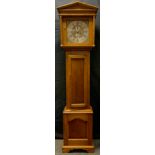 A 19th century oak longcase clock, 31cm diam, with silvered chapter ring, with Roman numerals,