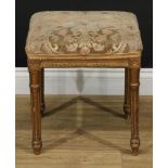 A 19th century giltwood stool, in the Louis XVI taste, stuffed-over seat, turned and fluted legs