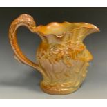 A 19th century S. & H. Briddon, Brampton brown salt glazed stoneware Neptune jug, dolphin handle,