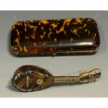 A 19th century tortoiseshell rounded rectangular cigar case, 15cm wide, c.1860; a miniature