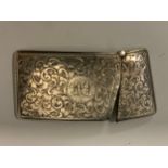 A Victorian bowed rectangular card case, engraved and chased with foliate scrolls, 8.5cm long,