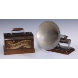 An early 20th century phonograph, The Graphophone, the base 23cm wide