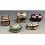 A Limoges rounded rectangular trinket box and cover, painted with flower sprigs, 7cm wide, printed