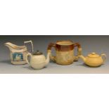 A Denby salt glazed stoneware two handled loving cup, in relief with windmill, monkeys and tree,